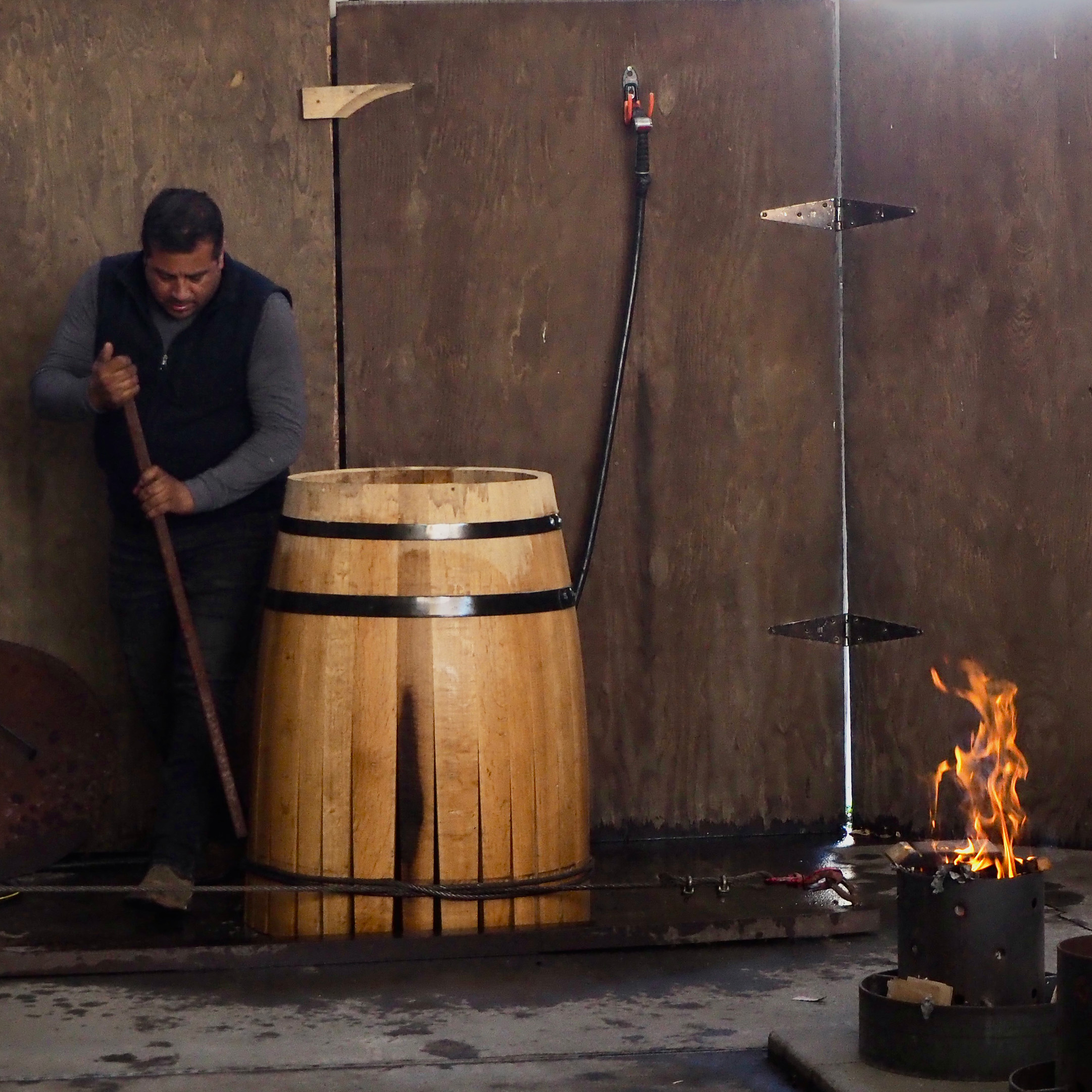 Ramiro Herrera toasting barrels