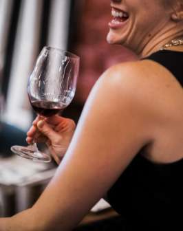 Customer enjoying a glass of wine